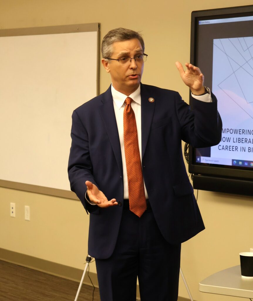Dr. Hummel speaks.
