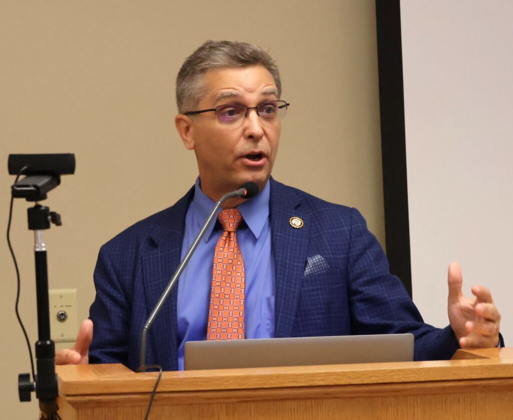 Dr. Scott Hummel speaks at the beginning of the ceremony.