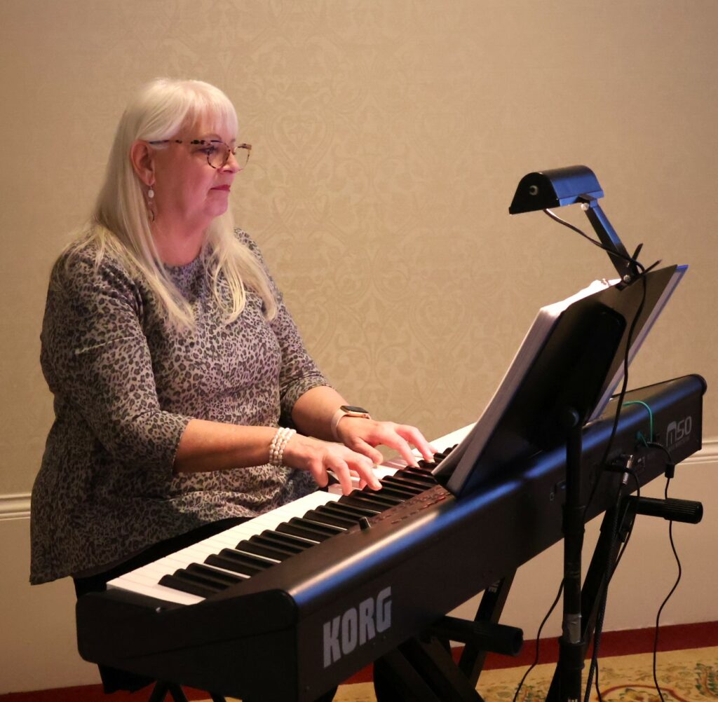 Susan McKenzie plays at the reception.