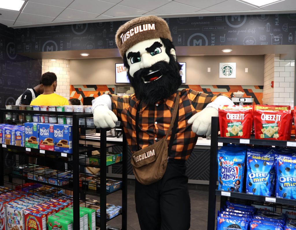 Zeke stands by some of the snacks.