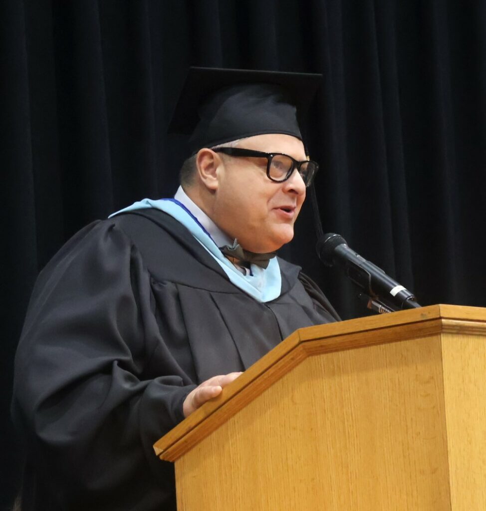 Edward Roberts addresses the graduates.