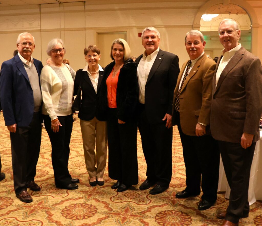 Left to right are Dr. Larry Brotherton, Carmen Brotherton, Nikki Niswonger, Kristine Taylor, Billy Taylor, Dr. Greg Nelson and Dr. Scott Niswonger.