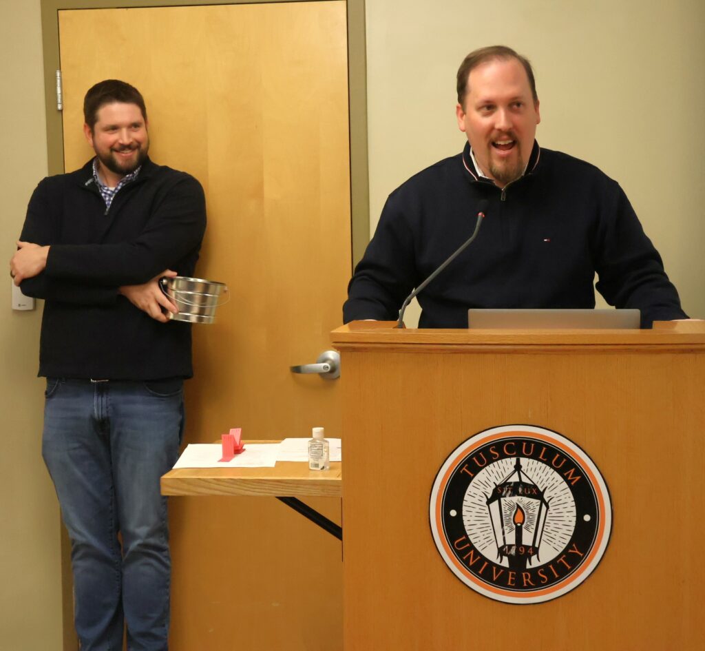 Dr. David Cook speaks as Dr. Chris Shumate listens.