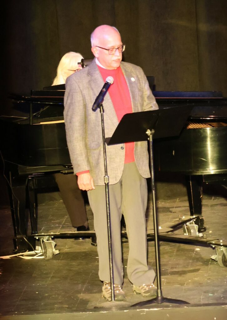 Alan Corley, the City of Tusculum's mayor, helps emcee the event.