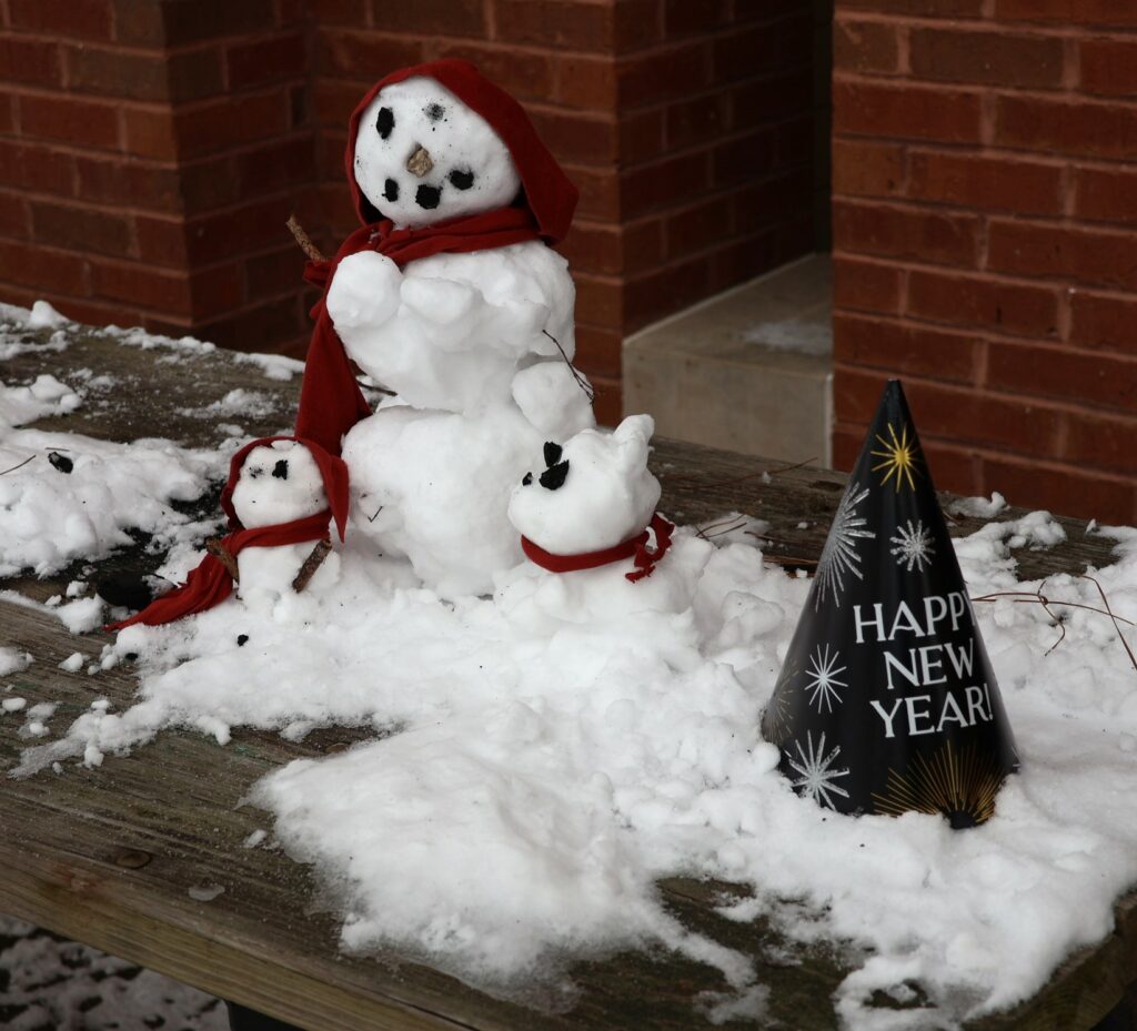 We have a snowman and a greeting outside Apartment C.