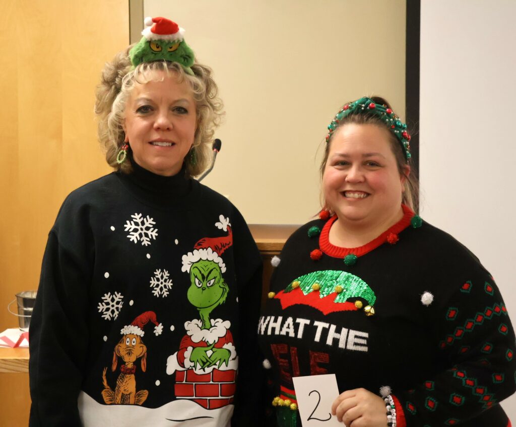 Benita Bare, left, and Megan Pierce were the entrants in the crazy Christmas apparel contest.