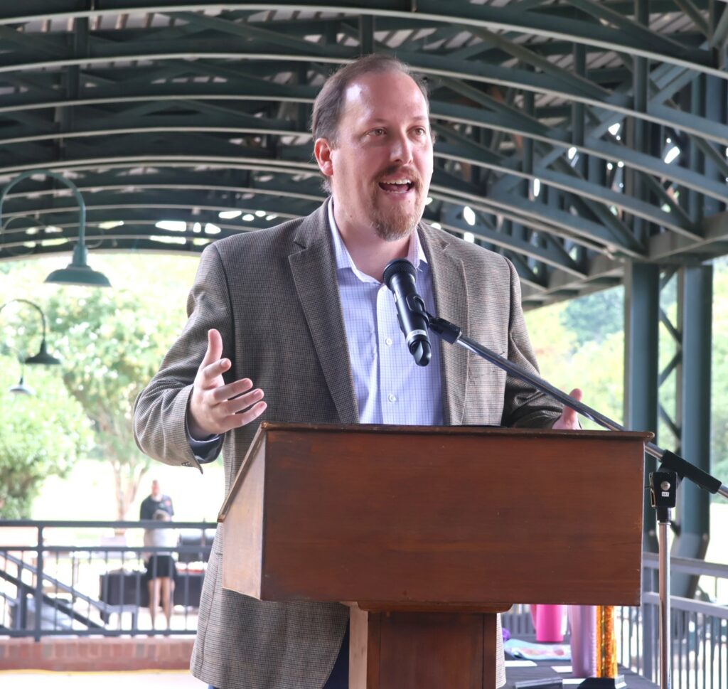 Dr. David Cook greets everyone.