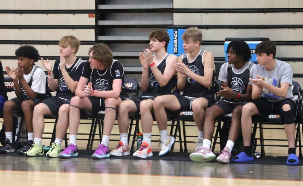 Players cheer their teammates.