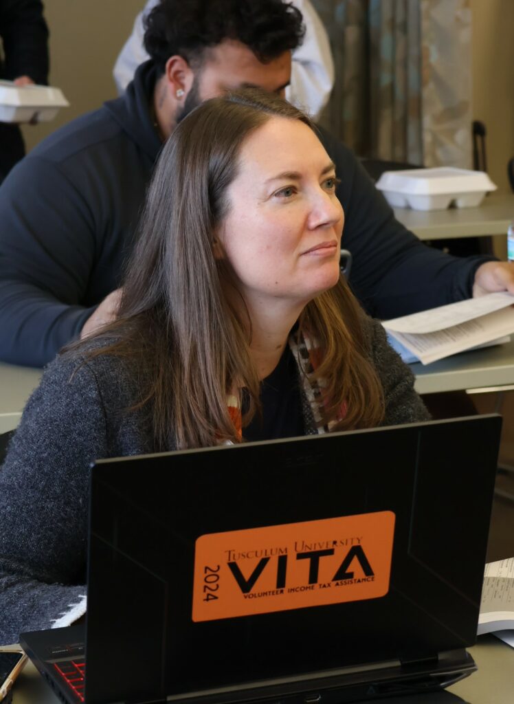 A community volunteer listens during the VITA training Saturday.