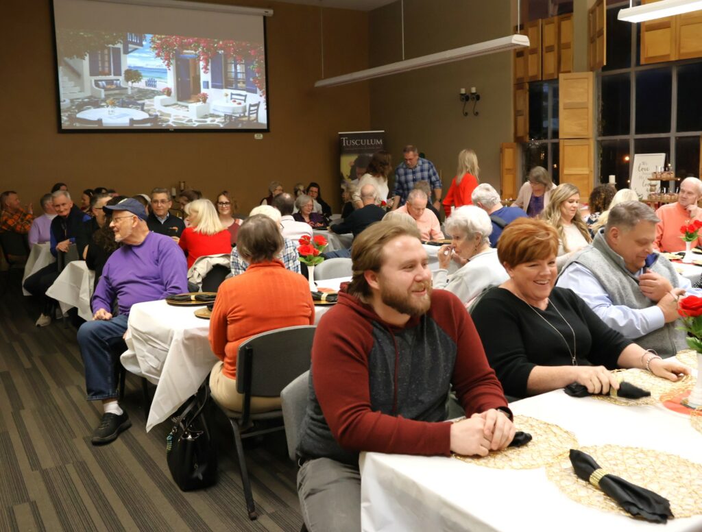 Attendees gather for dinner.