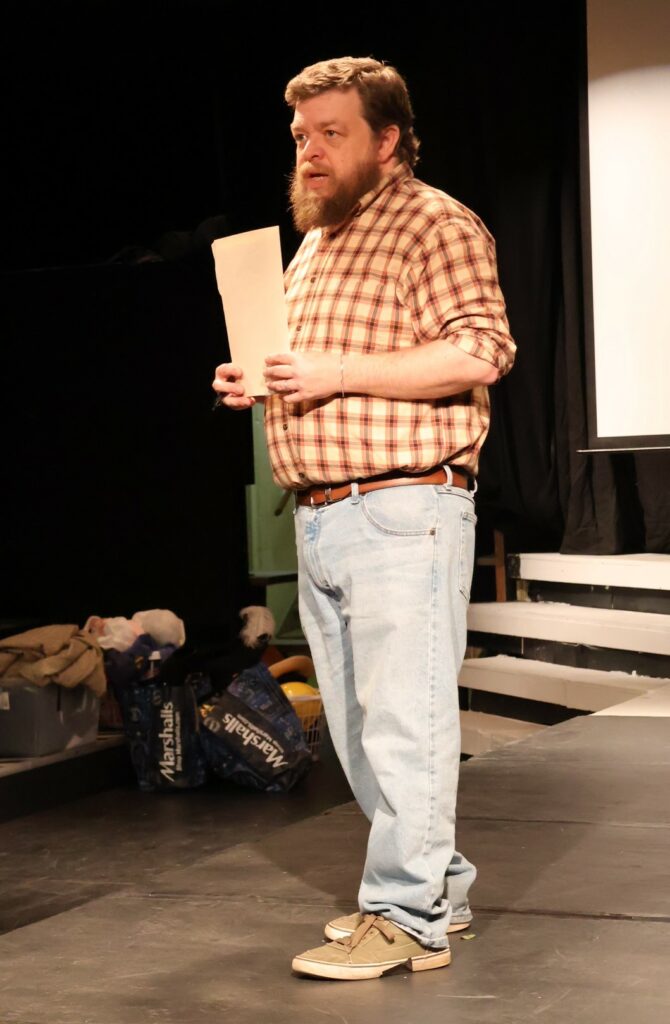 Steve Schultz speaks with potential cast members.