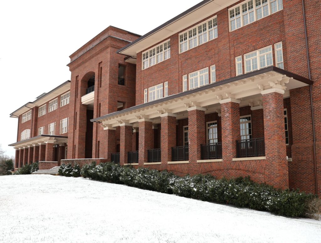 The front of the Meen Center in the snow
