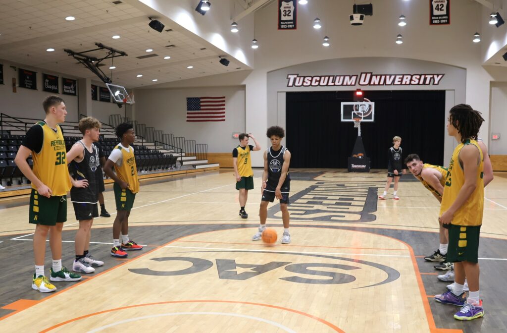 A player prepares to shoot a free throw.