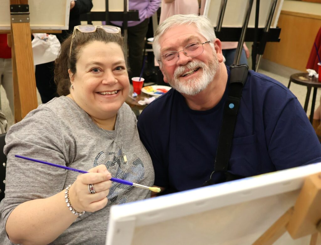 A couple enjoys a moment together.