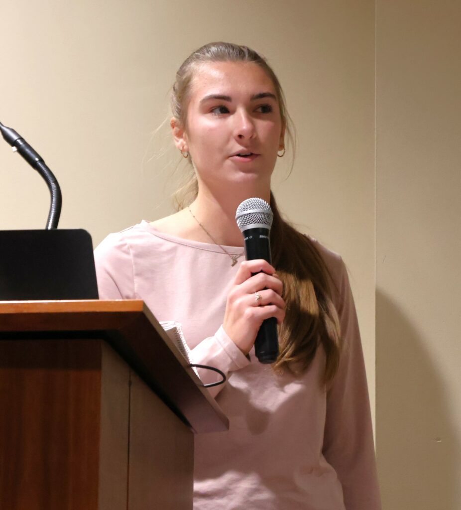 A student shares her thoughts during the debate.