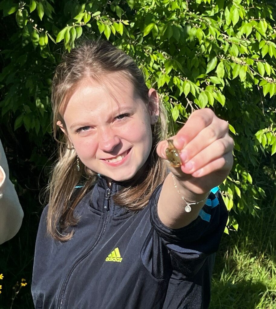 A Girl Scout finds a critter in College Creek.
