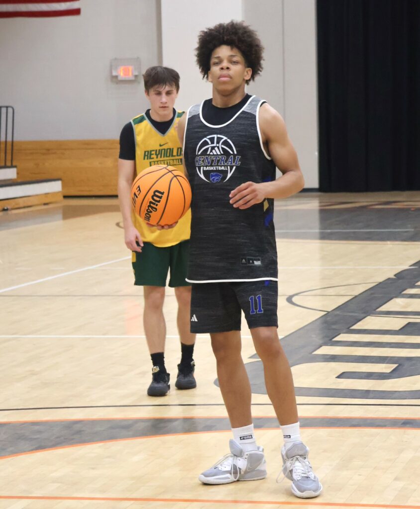 A player prepares for a free throw.
