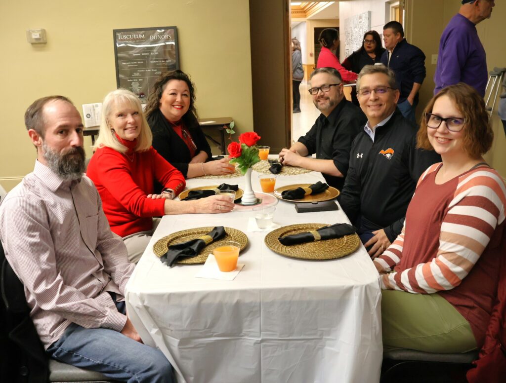 Guests prepare for dinner.
