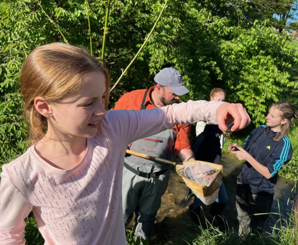A Girl Scout finds a critter in College Creek.