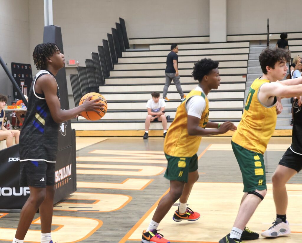 A player looks for a teammate so he can pass him the ball.