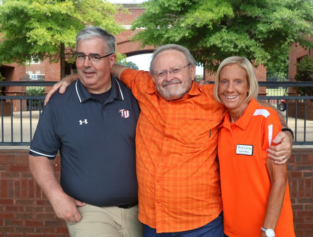 Left to right, Dom Donnelly, Chris Summey and Denise Burns have a good time.