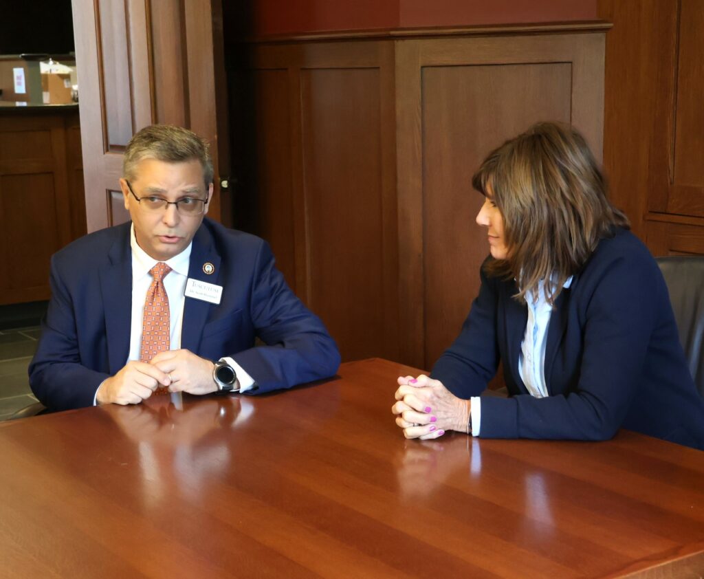 Dr. Scott Hummel makes a point as Congresswoman Diana Harshbarger listens.