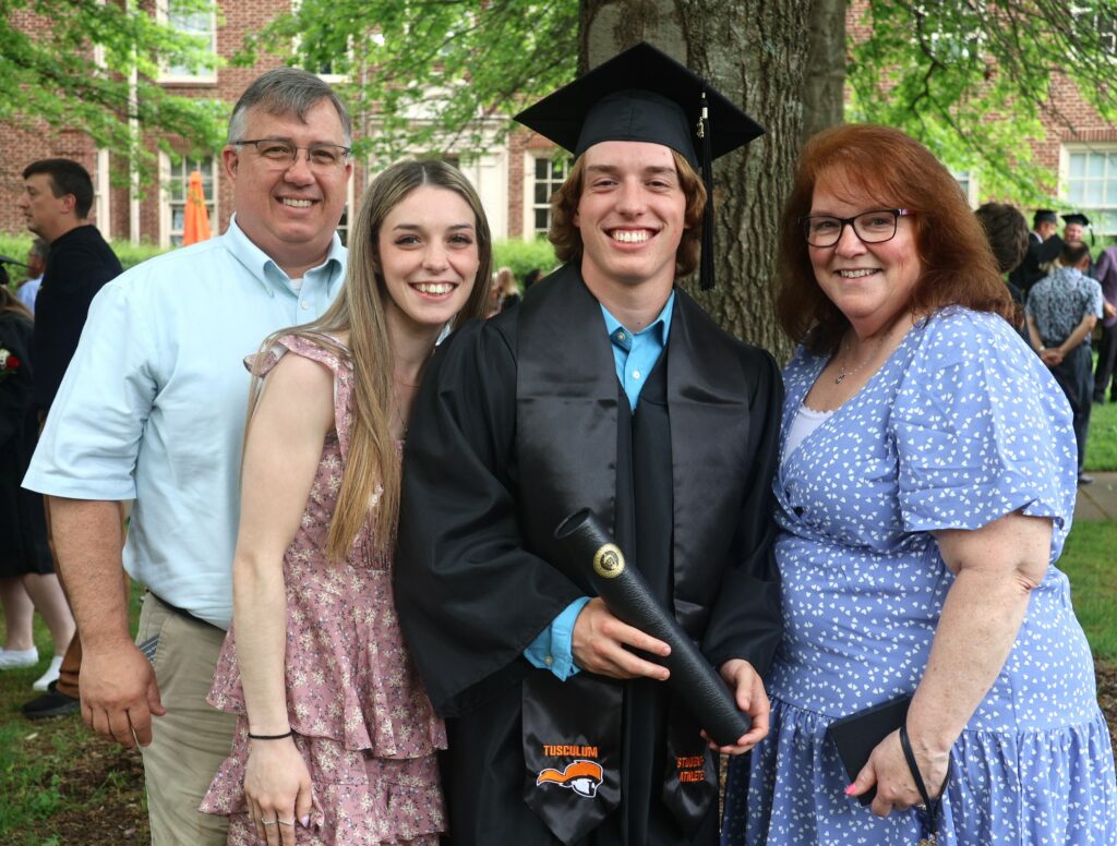 A family celebrates graduation.