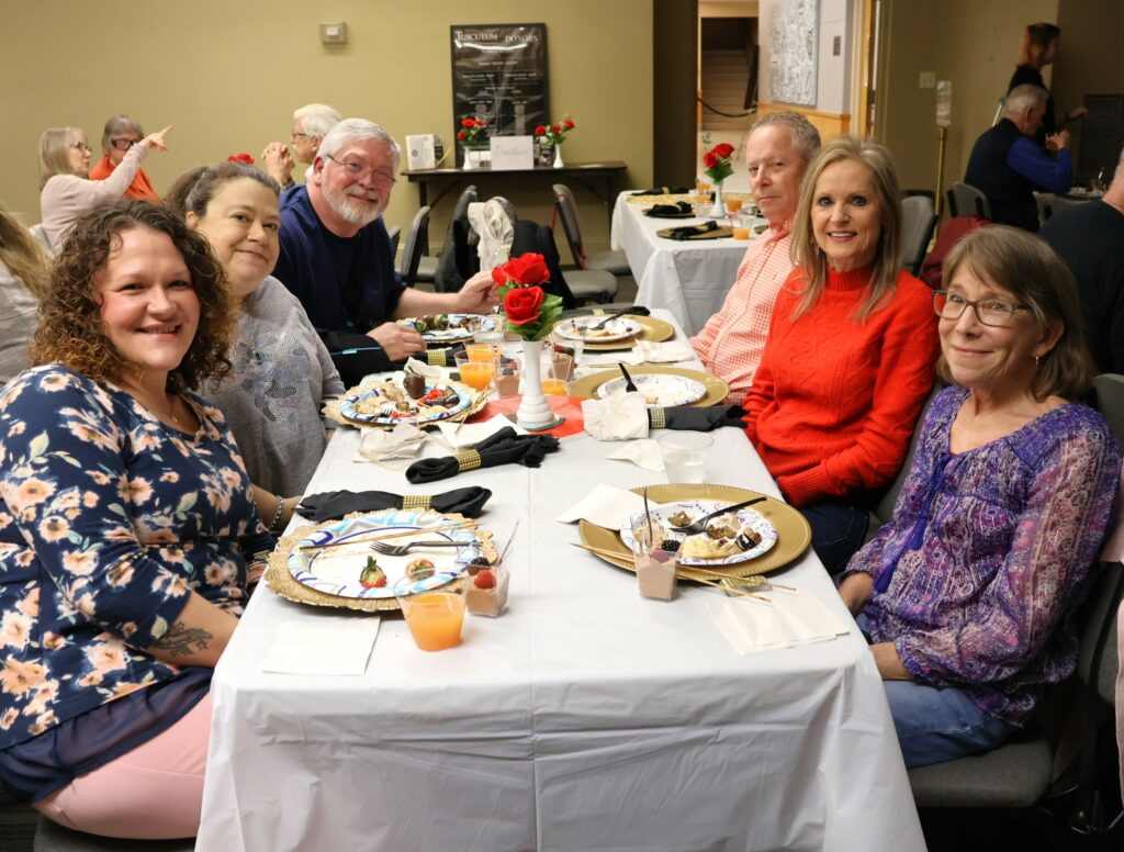 Guests prepare for dinner.