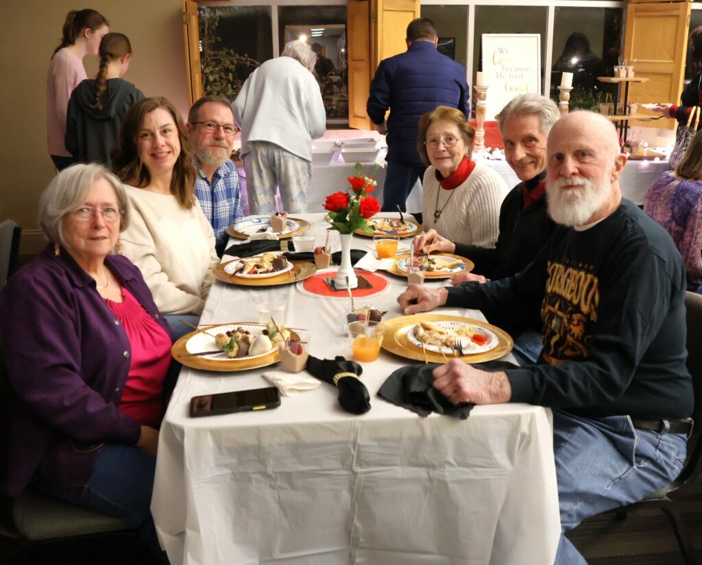 Guests prepare for dinner.