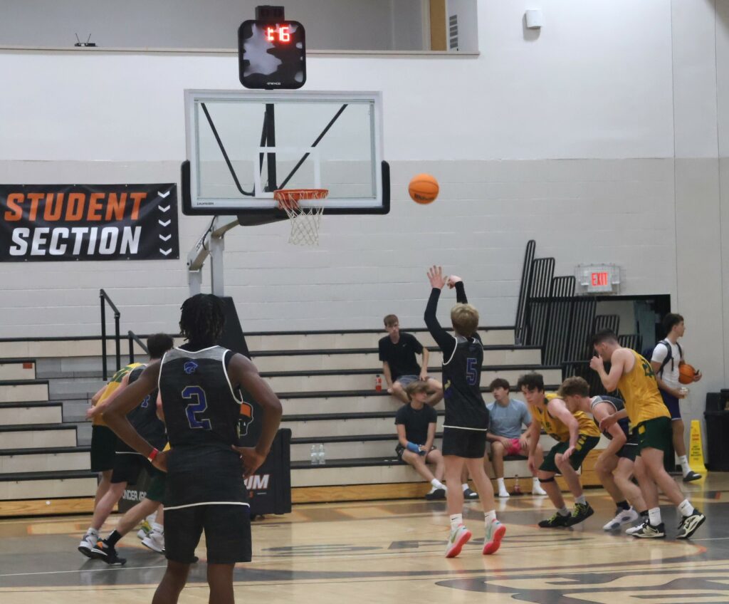 A player shoots a free throw.