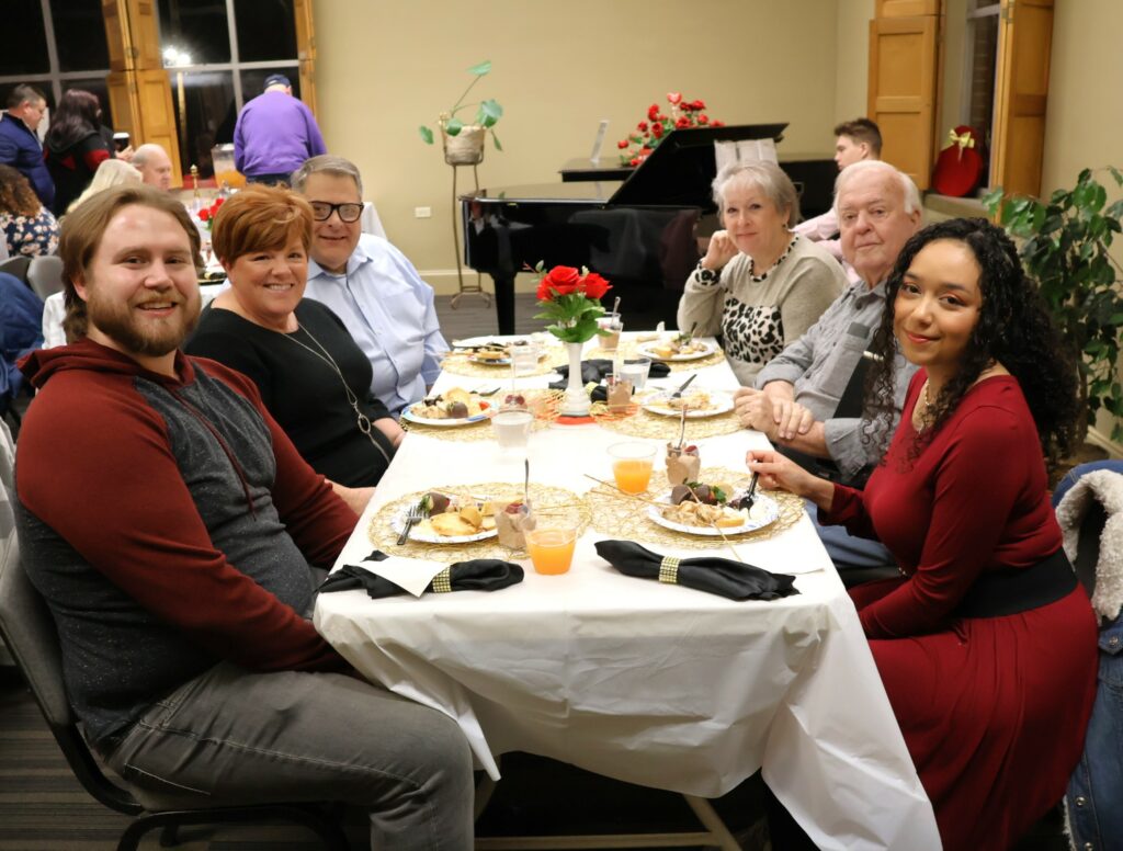 Guests prepare for dinner.