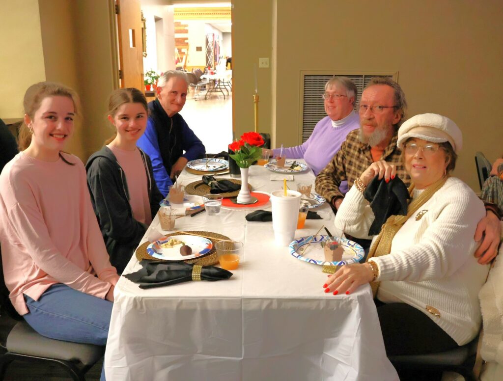 Guests prepare for dinner.