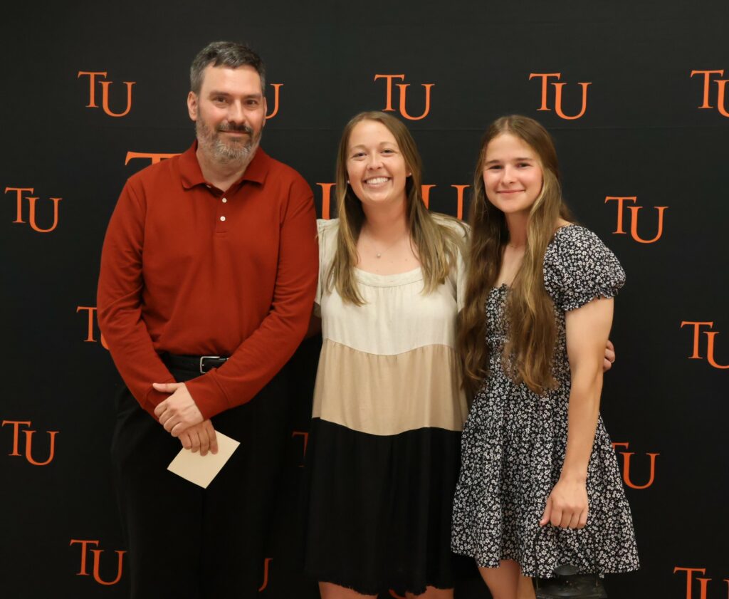 Left to right are Dr. Chuck Pearson, Keylon Reynolds and Brooke Smith.