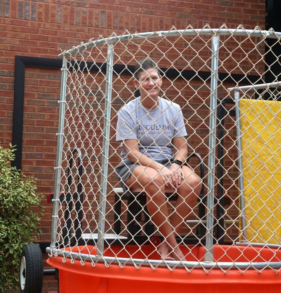 Dr. Suzanne Byrd prepares to be dunked.