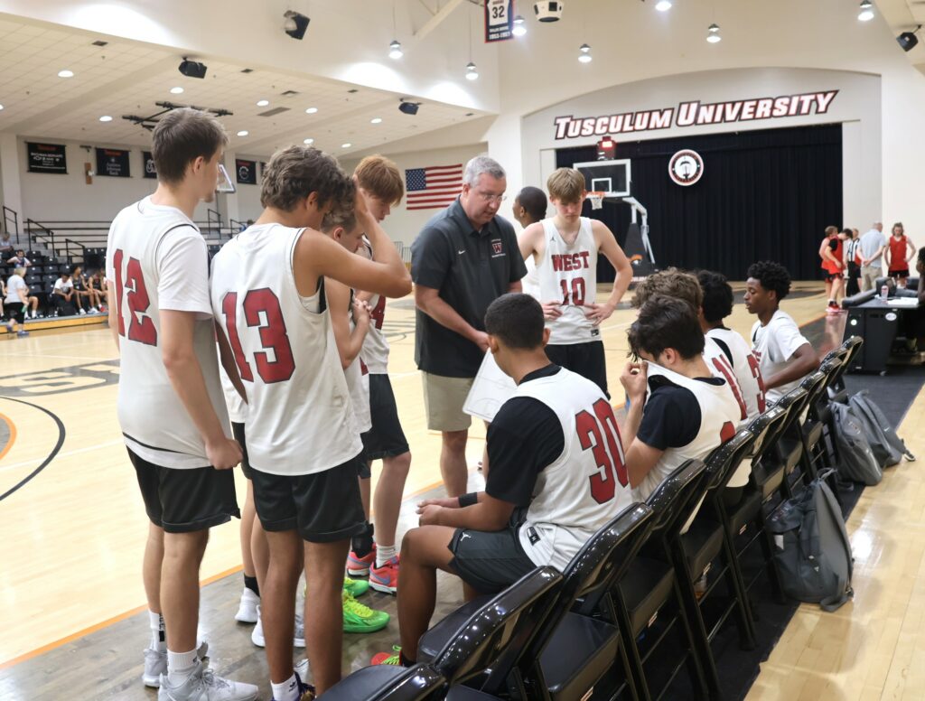 A team talks during a timeout.