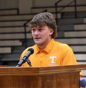 Jordan York, one of the injured students, speaks at the service.