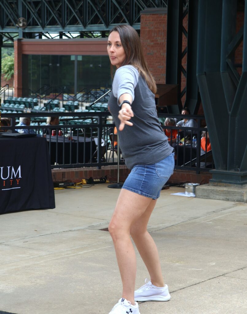 April Lane prepares to throw a ball during the dunking booth activity.