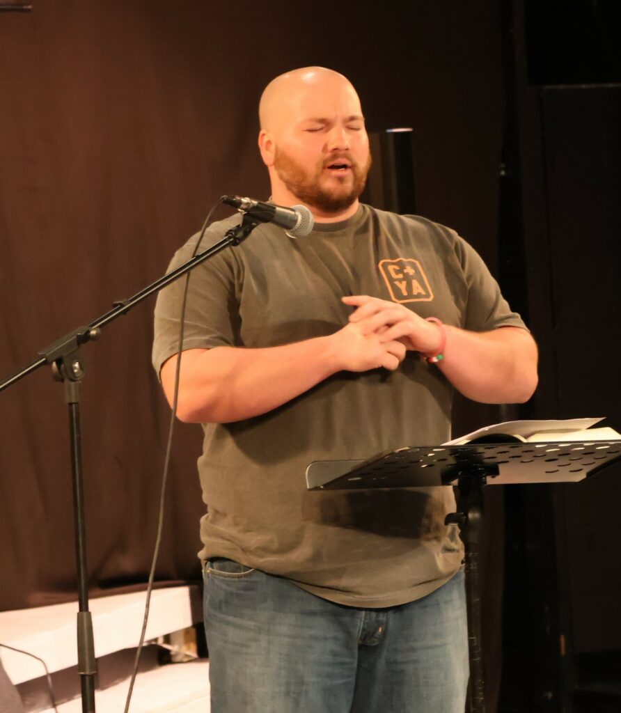 Harrison Nasekos delivers a message.