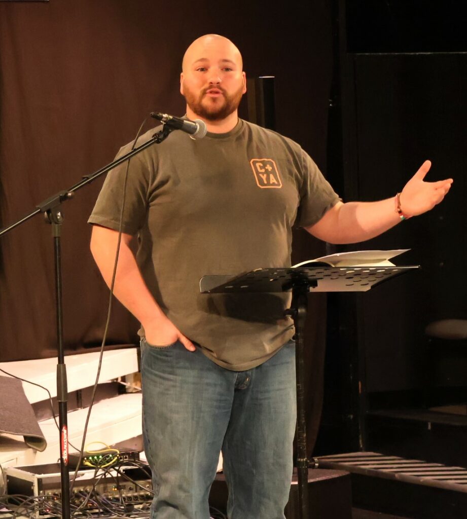 Harrison Nasekos delivers a message.