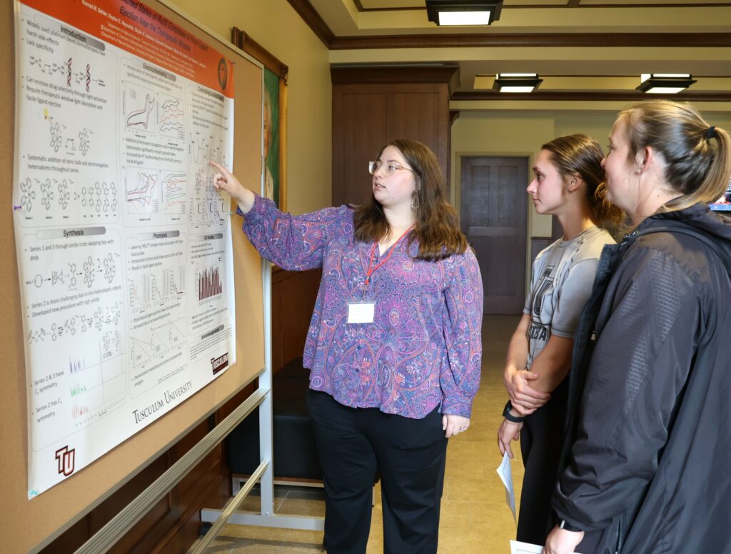 Skylar Lane discusses her poster.