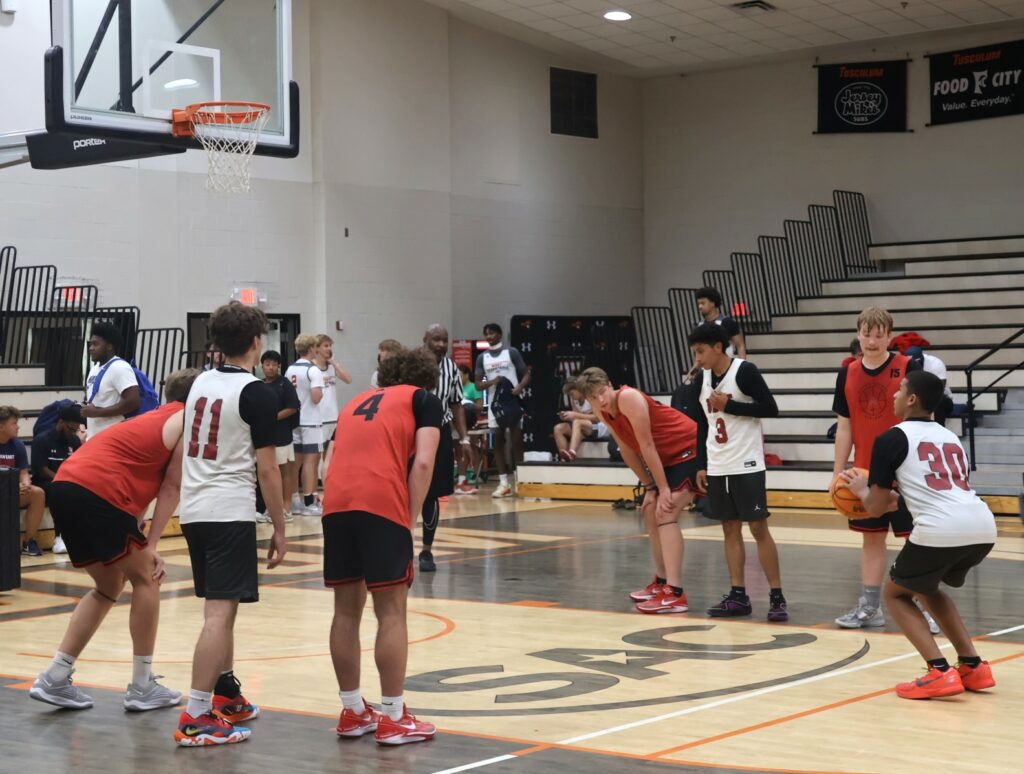 A player prepares to shoot a free throw.