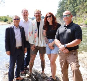 Left to right, Dr. Scott Hummel, Dr. David Cook, Dare Crusade, Jessica Crusade and the Rev. E.J. Swatsell pose after the baptism.