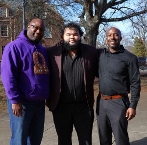 Xavier Velazquez, middle, stands with Chuck Sutton, right, from the Office of Student Affairs and Steve Anderson from Student Support Services after the ceremony.
