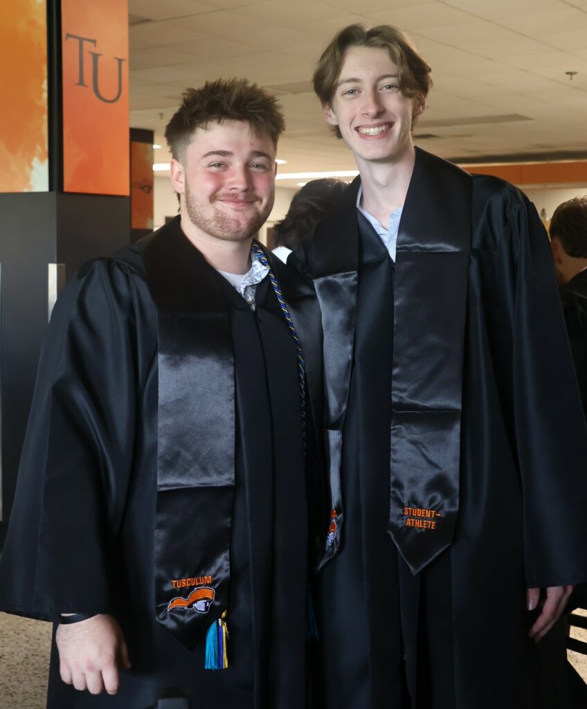 Konrad Sehler, left, and Gabe Taulbee relax before the ceremony.
