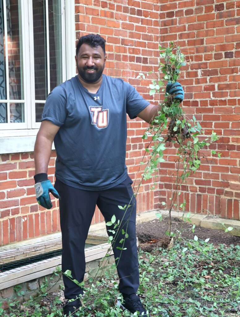 Head Tennis Coach Garcian D'Cruz shows the fruits of his labor.