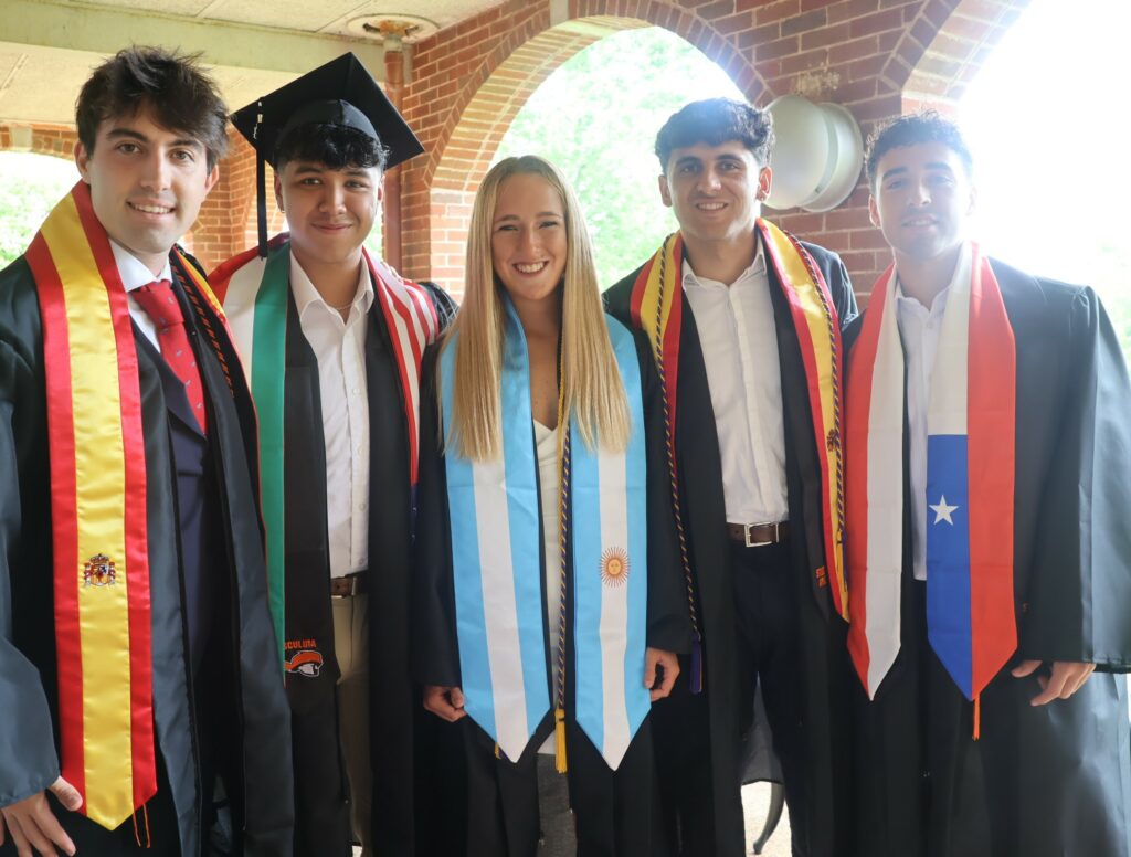 International students relax before the ceremony.