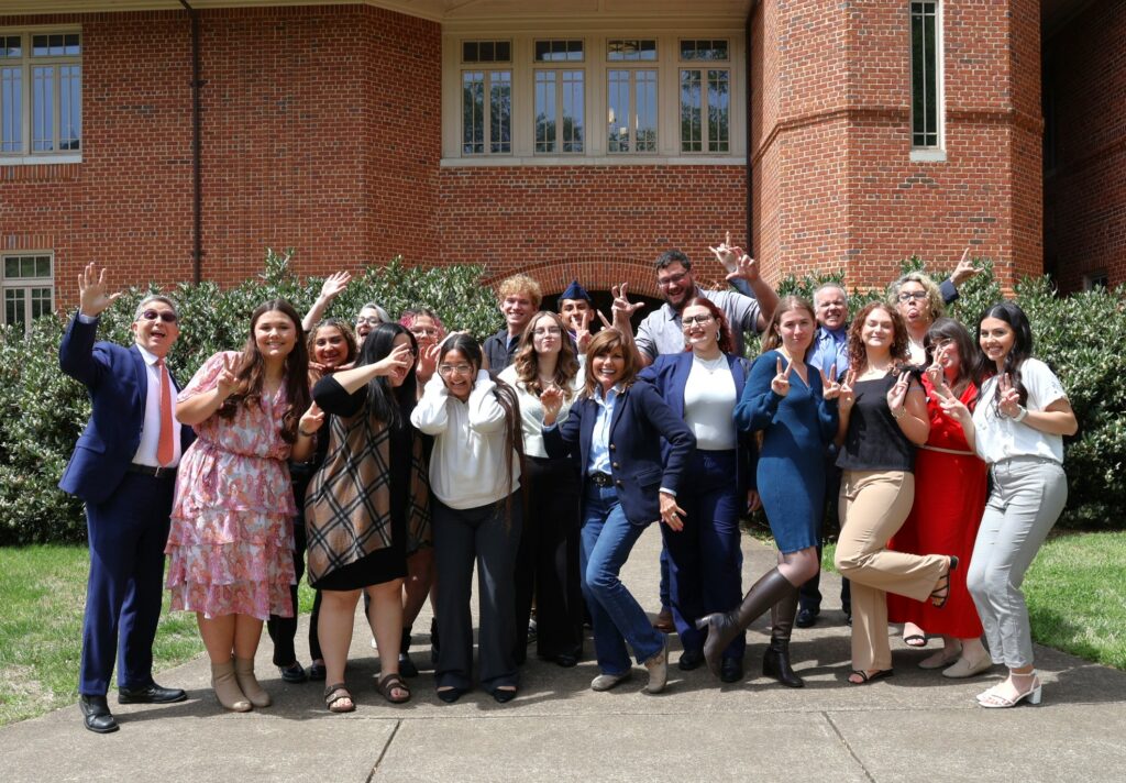 Congresswoman Diana Harshbarger, center, has fun with TRIO students and staff.