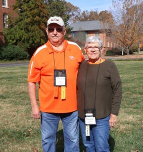 Harold Svarplaitis, left, and his sister, Ruth Staas, stand in the Quad in front of the Scott M. Niswonger Commons.