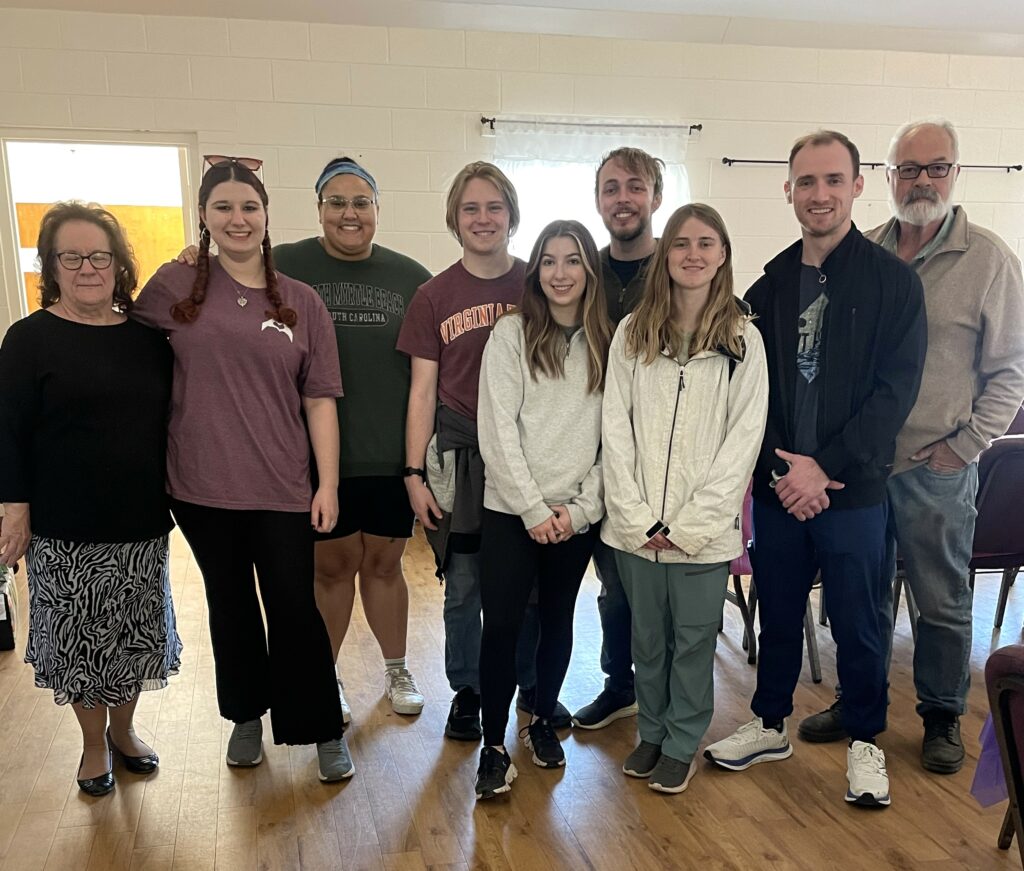 The Tusculum group poses with representatives of Eagle Rock Church.