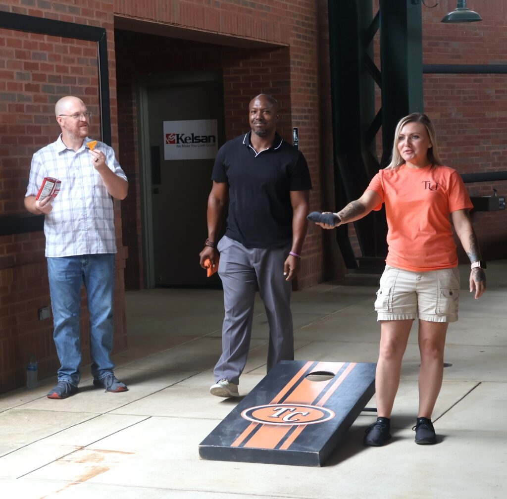 Tossing a cornhole bag